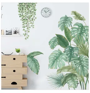 Detail of tropical monstera deliciosa leaf wall decals in a Nordic living room decor