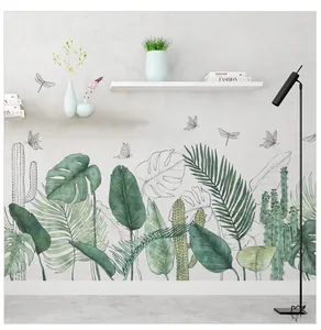 Detail von nordischen Tropenblatt-Wandtattoos mit Monstera-Motiven und Lebensmotto