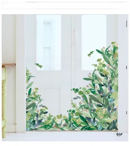 Detail of green leaf wall decals with eucalyptus patterns and motivational quotes