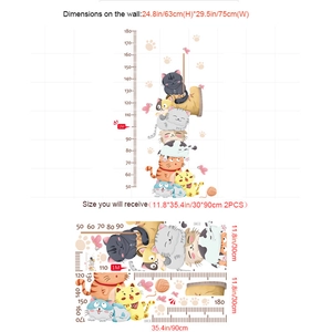 Close-up of cute cartoon cats height measurement wall sticker with 50-180cm scale