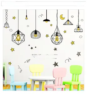 Detail of Nordic wall decals with hanging lamps, stars and motivational quotes for home decor