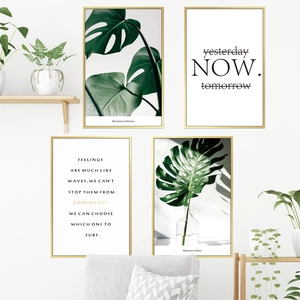 Set of 4 framed wall art prints featuring Monstera leaves and minimalist quotes for home