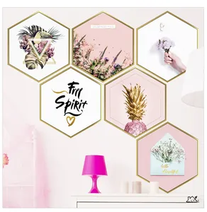 Set of six hexagonal gold framed wall art featuring tropical leaves and floral designs