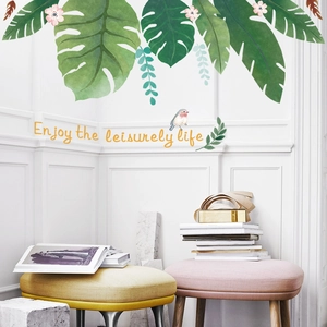 Sticker mural feuilles tropicales avec oiseau et citation pour décoration de salon