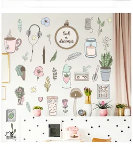 Détail de stickers muraux autocollants style Mori avec motifs de café et plantes