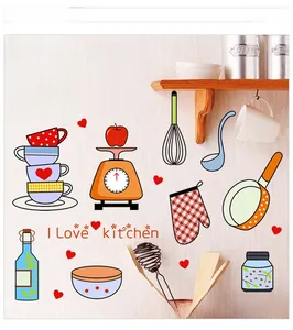 Detailed view of kitchen wall decals featuring cartoon scale and colorful utensil stickers