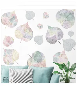Detailed close-up of watercolor leaf wall stickers with artistic vein textures on wall