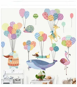 Hot air balloon wall stickers showing cute animals in a soft colored nursery room