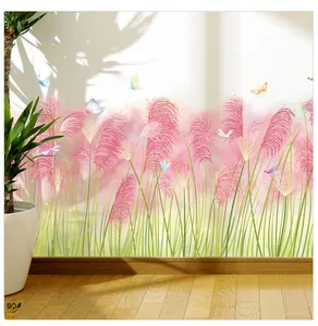 Detail showing pink reed plant wall decals with colorful butterflies on a white wall
