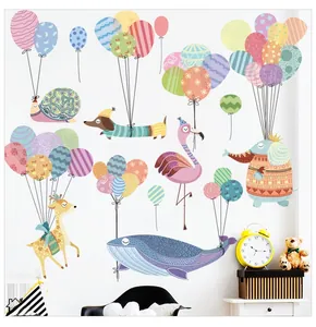 Detail of cartoon animal wall stickers with colorful balloons in soft pastel colors