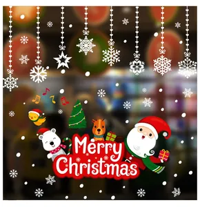 Détail de stickers de Noël avec Père Noël et renne pour la décoration de vitrines de fête