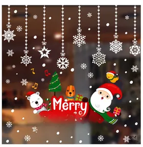 Détail de stickers de Noël pour fenêtre avec Père Noël, renne et flocons de neige déco