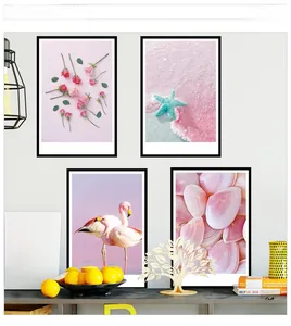Detail of four-piece Nordic wall art featuring pink roses, flamingos, and beach seashells