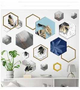 Detail of modular hexagonal wall stickers with gold trim, marble, and leaf patterns