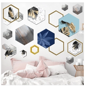Detail view of modern hexagonal wall stickers with marble patterns and golden leaves