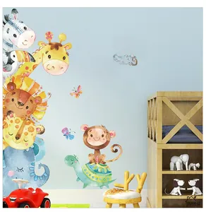 Close-up of watercolor cartoon animals giraffe and lion wall decals for nursery decor