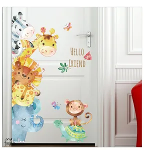 Nursery wall stickers with watercolor animals applied on a white wooden door decor