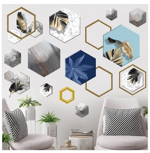 Modern hexagon wall stickers with marble and gold leaf patterns in a living room setting