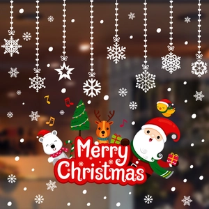 Stickers de Noël pour vitrines avec Père Noël et rennes pour une déco festive en verre