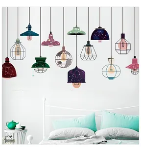 Detail of DIY self-adhesive wall stickers with hanging lamps and motivational text