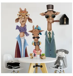 Detail showing creative rock giraffe wall stickers with sunglasses and cool accessories