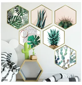 Set of 6 hexagonal wall stickers with gold frames and vibrant green tropical plants