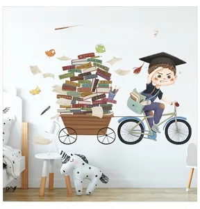 Detail of cartoon boy with books wall decal featuring motivational Chinese text for study rooms