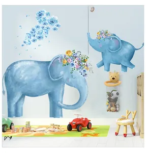 Detail of baby elephant wall decals with heart balloon and flowers in a nursery setup
