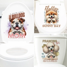 Close-up of adorable cartoon dog stickers on white toilet lid featuring various breeds