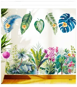 Détail de stickers muraux avec feuilles de monstera tropicales et palmier aquarelle