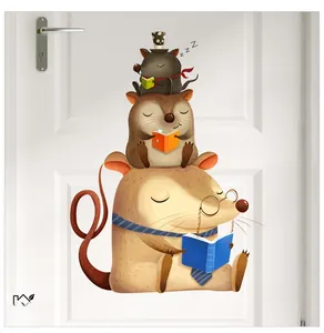 Close-up of cute cartoon mice reading books wall sticker on a white wooden door