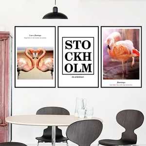 Three-piece modern flamingo wall art set with Stockholm text in narrow black frames