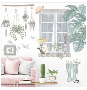 Detail view of Scandinavian style wall stickers featuring cats and green potted plants