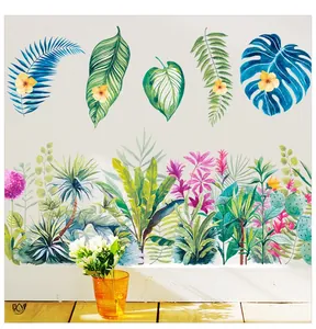 Détail de stickers muraux avec feuilles tropicales et fleurs style aquarelle douce