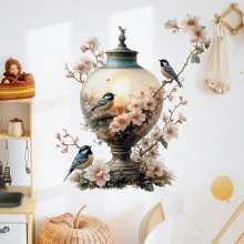 Detail of artistic lamp wall sticker with pink flowers and birds on white wall