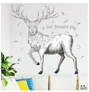 Detail of modern geometric deer wall sticker featuring Let Dreams Fly quote for home decor