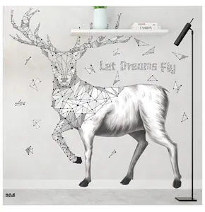 Detail of Nordic deer wall sticker with geometric antlers and Let Dreams Fly quote