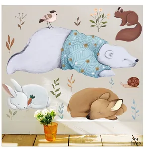 Close-up of matte wall stickers featuring a polar bear, deer and rabbit in a nursery room