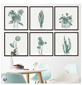 Détail d'un lot de six tableaux muraux nordiques avec feuilles de monstera et cadres noirs