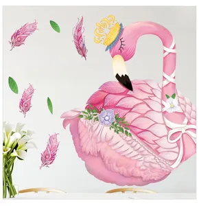 Detail of pink flamingo wall sticker with golden crown and romantic floral accents