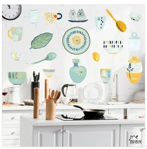 Detail of waterproof kitchen wall decals featuring hand-drawn dishes and lemon patterns