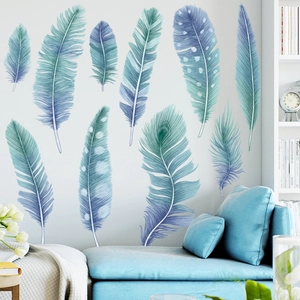 Blue feather wall stickers set for modern living room decor on light blue sofa background