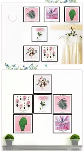 Set of 6 minimalist black framed floral wall art prints featuring pink roses and palms