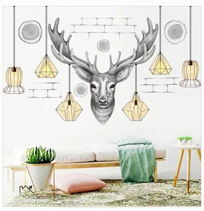 Detail of Nordic wall decals with reindeer head, hanging lamps and geometric elements