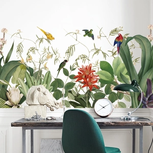Tropical wall sticker with green leaves, red flowers, and colorful birds in a room set