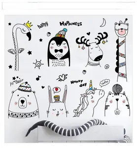 Detail of Nordic cartoon animal wall stickers featuring flamingos and giraffes in kids' room