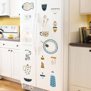 Hand-painted kitchen wall stickers featuring cats and fish on a white refrigerator