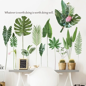 Tropical monstera and palm leaf wall stickers set in a Nordic style home office setup