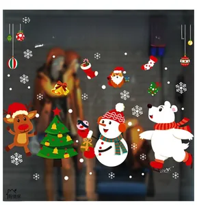 Detailed Christmas window decals featuring Merry Christmas text, snowmen, and reindeer stickers