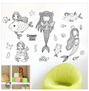 Detail of mermaid ocean wall decals with hand-drawn fish and sea life in a kids room